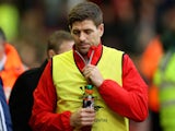 Steven Gerrard of Liverpool walks to the bench before the Barclays Premier League match between Liverpool and Sunderland at Anfield on December 6, 2014