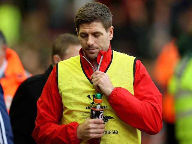 Steven Gerrard of Liverpool walks to the bench before the Barclays Premier League match between Liverpool and Sunderland at Anfield on December 6, 2014