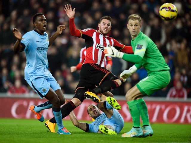 Connor Wickham of Sunderland scores the opening goal during the Barclays Premier League match between Sunderland and Manchester City at The Stadium of Light on December 3, 2014