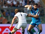 Tito Tebaldi of Italy is tackled by Chris Robshaw of England during the RBS Six Nations match between Italy and England at Stadio Olimpico on March 15, 2014