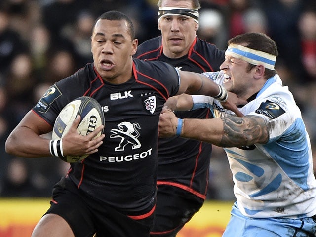 Toulouse's French centre Gael Fickou challenges Glasgow's Scottish prop Ryan Grant during the European Champions Cup rugby union match between Toulouse and Glasgow at the Ernest Wallon Stadium in Toulouse, southern France, on December 7, 2014