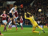 Craig Dawson of West Brom heads and scores the opening goal past Adrian of West Ham during the Barclays Premier League match between West Bromwich Albion and West Ham United at The Hawthorns on December 2, 2014
