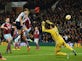 Half-Time Report: Tomkins gives West Ham lead