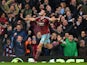 West Ham United's English striker Andy Carroll celebrates scoring their first goal to equalise during the English Premier League football match between West Ham United and Swansea City at the Boleyn Ground, Upton Park, in east London on December 7, 2014