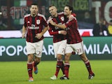 Giacomo Bonaventura of AC Milan celebrates his goal with his team-mate Jeremy Menez during the Serie A match between AC Milan and SSC Napoli at Stadio Giuseppe Meazza on December 14, 2014