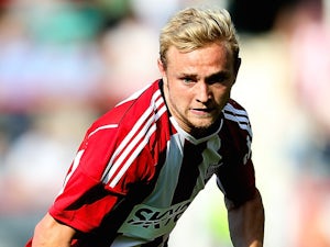 Alex Pritchard of Brentford in action during the Pre Season Friendly between Brentford and Nice at Griffin Park on July 26, 2014