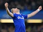 Chelsea's German striker Andre Schurrle celebrates scoring his team's second goal during the UEFA Champions League group G football match at Stamford Bridge in London on December 10, 2014
