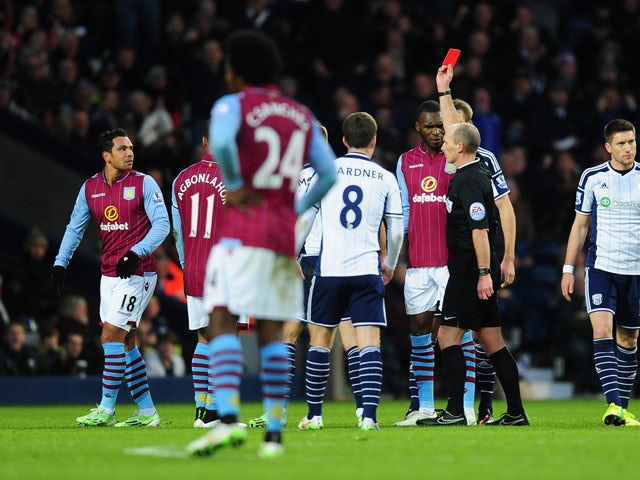 Kieran Richardson of Villa is shown a straight red card and sent off by referee Mike Dean during the Barclays Premier League match between West Bromwich Albion and Aston Villa at The Hawthorns on December 13, 2014