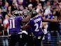 Wide receiver Kamar Aiken #11 of the Baltimore Ravens celebrates with free safety Darian Stewart #24 and linebacker Zach Orr #54 after scoring a first quarter touchdown off a blocked punt against the Jacksonville Jaguars at M&T Bank Stadium on December 14