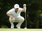 Branden Grace of South Africa putts on the 17th green during the second round of the Alfred Dunhill Championship at Leopard Creek Country Golf Club on December 12, 2014