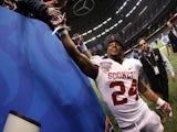 Brennan Clay #24 of the Oklahoma Sooners celebrates on the field after defeating the Alabama Crimson Tide 45-31 during the Allstate Sugar Bowl at the Mercedes-Benz Superdome on January 2, 2014