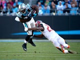 Jerricho Cotchery #82 of the Carolina Panthers lunges for more yardage in the 2nd half against the Tampa Bay Buccaneers during their game at Bank of America Stadium on December 14, 2014
