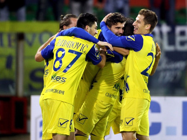 Riccardo Meggiorini of Chievo celebrated the goal 0-1 with the team-mates during the Serie A match between Cagliari Calcio and AC Chievo Verona at Stadio Sant'Elia on December 8, 2014