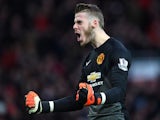 David De Gea of Manchester United celebrates the first goal during the Barclays Premier League match against Liverpool on December 14, 2014