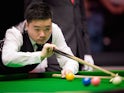 China's Ding Junhui plays a shot during his first round match against England's Shaun Murphy on day three of the Masters Snooker tournament at Alexandra Palace in London on January 14, 2014