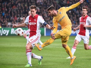 Half-Time Report: Schone strike hands Ajax lead