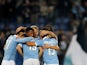 Senad Lulic #19 with his teammates of SS Lazio celebrates after scoring the third team's goal during the Serie A match between SS Lazio and Atalanta BC at Stadio Olimpico on December 13, 2014