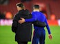 Louis van Gaal, manager of Manchester United hugs Robin van Persie of Manchester United after the Barclays Premier League match between Southampton and Manchester United at St Mary's Stadium on December 8, 2014