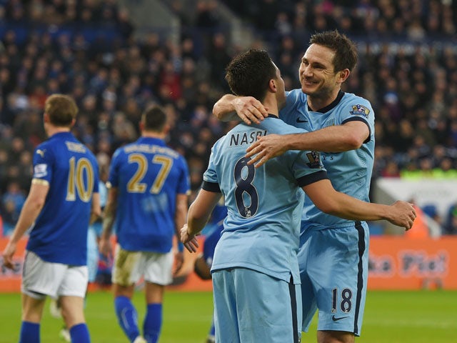 Frank Lampard of Manchester City celebrate Samir Nasri of Manchester City after scoring the opening goal during the Barclays Premier League match between Leicester City and Manchester City at The King Power Stadium on December 13, 2014
