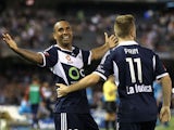 Archie Thompson of Victory celebrates after scoring a goal during the round 11 A-League match between Melbourne Victory and Sydney FC at Etihad Stadium on December 13, 2014