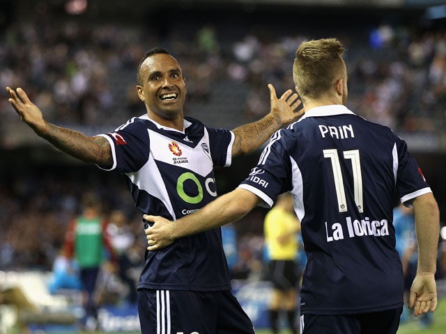 Archie Thompson of Victory celebrates after scoring a goal during the round 11 A-League match between Melbourne Victory and Sydney FC at Etihad Stadium on December 13, 2014