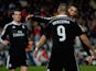 Gareth Bale, Karim Benzema and Cristiano Ronaldo celebrate Real Madrid's third goal during the La Liga match against Almeria on December 12, 2014