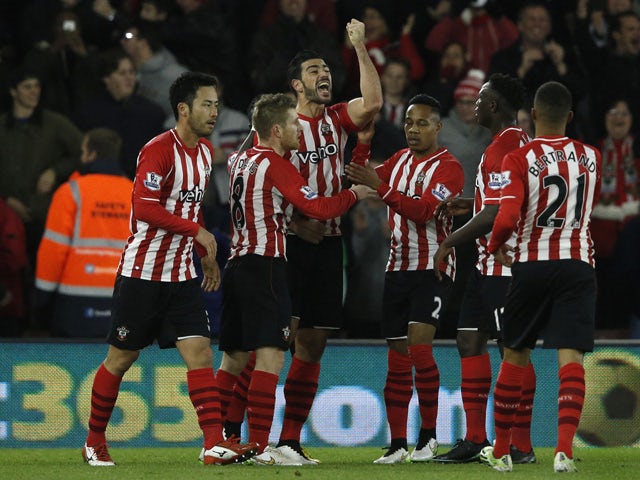 Southampton's Italian striker Graziano Pelle celebrates scoring their first goal to equalise during the English Premier League football match between Southampton and Manchester United at St Mary's Stadium in Southampton, southern England on December 8, 20