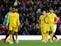 Steven Gerrard and teammates look dejected after Manchester United's second goal during the Premier League match on December 14, 2014