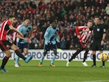 Jordi Gomez #14 of Sunderland scores the opening goal from the penalty spot during the Barclays Premier League match between Sunderland and West Ham United at Stadium of Light on December 13, 2014