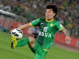 Zhang Xizhe of Beijing Guo'an controls the ball during their AFC Champions League Group Stage football match against FC Seoul at the Workers Stadium in Beijing on May 14, 2013