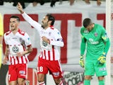 Ajaccio's French midfiedler Johan Cavalli celebrates after scoring a penalty shot during the French League Cup football match Ajaccio (ACA) vs Paris Saint-Germain (PSG) on December 17, 2014