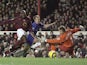 Arjen Robben of Chelsea slides the ball into the goal as Jens Lehmann and Sol Campbell of Arsenal can only look on during the Barclays Premiership match on December 18, 2005