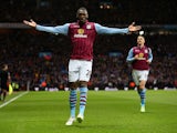 Christian Benteke of Aston Villa celebrates scoring the opening goal during the Barclays Premier League match between Aston Villa and Manchester United at Villa Park on December 20, 2014 