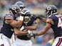 Ryan Mundy #21 of the Chicago Bears celebrates his interception with Jon Bostic #57, Christian Jones #59 and Brock Vereen #45 of the Chicago Bears during the second quarter of their game against the Detroit Lions at Soldier Field on December 21, 2014