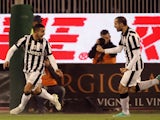 Carlos Tevez of Juventus celebrates the goal 0-1 during the Serie A match betweeen Cagliari Calcio and Juventus FC at Stadio Sant'Elia on December 18, 2014