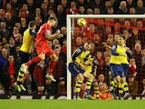 Martin Skrtel of Liverpool heads the equalising goal during the Barclays Premier League match between Liverpool and Arsenal at Anfield on December 21, 2014