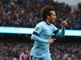 David Silva of Manchester City celebrates scoring his team's second goal during the Barclays Premier League match between Manchester City and Crystal Palace at Etihad Stadium on December 20, 2014