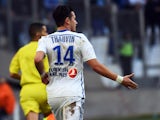 Marseille's French midfielder Florian Thauvin gestures after scoring a goal during the French L1 football match Marseille (OM) vs Lille (LOSC) on December 21, 2014