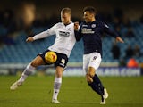 Matt Mills of Bolton Wanderers is challenged by Lee Gregory of Millwall during the Sky Bet Championship match on December 19, 2014