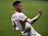 Monaco's Belgian midfielder Yannick Ferreira Carrasco reacts after scoring during the French League Cup football match Olympique Lyonnais against AS Monaco at the Gerland Stadium in Lyon, south-eastern France, on December 17, 2014