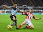 Ayoze Perez of Newcastle United is challenged by Lee Cattermole of Sunderland during the Barclays Premier League match between Newcastle United and Sunderland at St James' Park on December 21, 2014
