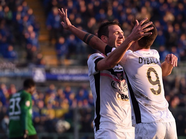 Franco Vazquez of Palermo celebrates with Paulo Dybala after scoring his team's third goal during the Serie A match betweeen Atalanta BC and US Citta di Palermo at Stadio Atleti Azzurri d'Italia on December 21, 2014