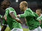 Saint-Etienne's Ivorian forward Max-Alain Gradel celebrates with his teammates after opening the scoring during the French L1 football match AS Saint-Etienne (ASSE) vs Evian (ETGFC) on December 21, 2014
