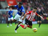 Sylvain Distin of Everton and Shane Long of Southampton battle for the ball during the Barclays Premier League match between Southampton and Everton at St Mary's Stadium on December 20, 2014