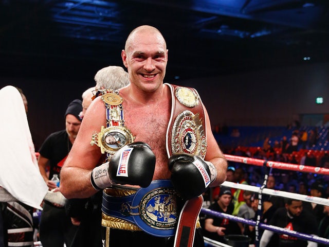 Tyson Fury of England celebrates defeating Dereck Chisora of England in the eliminator for the WBO World Heavyweight Championship during Boxing at ExCel on November 29, 2014
