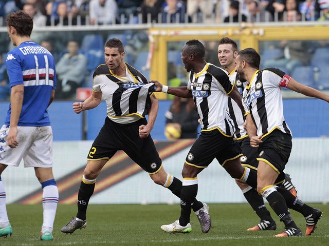 Alexandre Pazos Geijo of Udinese Calcio celebrates with his team-mate Babu Emmanuel Agyemang during the Serie A match betweeen UC Sampdoria and Udinese Calcio at Stadio Luigi Ferraris on December 21, 2014