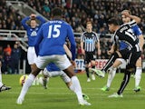 Newcastle United's Spanish striker Ayoze Perez (R) shoots to score their second goal during the English Premier League football match against Everton on December 28, 2014