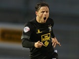 Andrew Tutte of Bury celebrates after scoring his sides 1st goal during the Sky Bet League Two match between Northampton Town and Bury at Sixfields Stadium on December 26, 2014