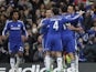 Chelsea's English defender John Terry celebrates scoring the opening goal with teammates during the English Premier League football match between Chelsea and West Ham United at Stamford Bridge in London on December 26, 2014