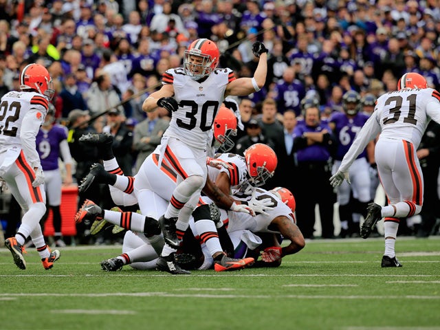 Free safety Jim Leonhard #30 of the Cleveland Browns celebrates after stopping the Baltimore Ravens on 4th down in the first quarter at M&T Bank Stadium on December 28, 2014